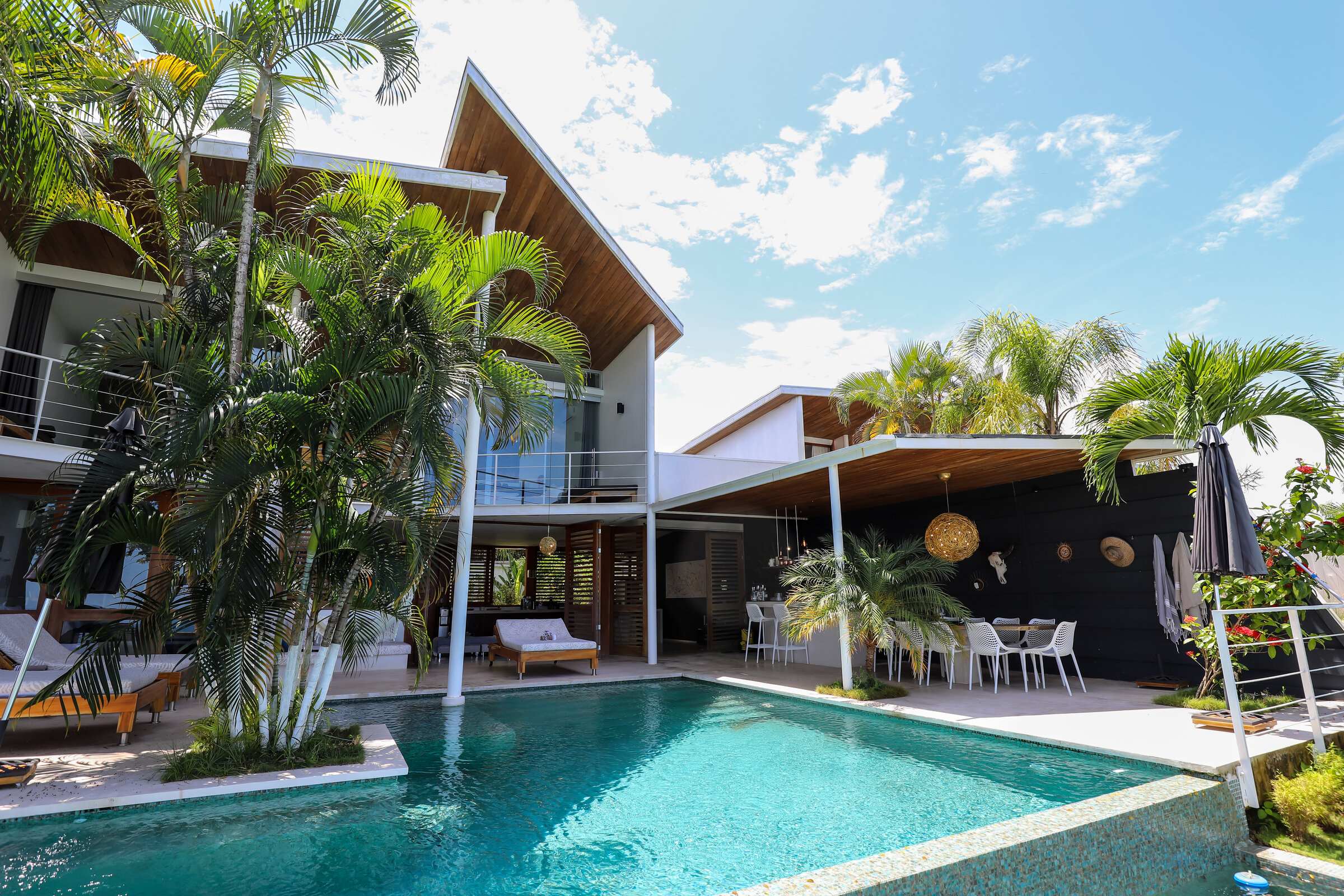 Casa Noa, pool and tropical architecture.